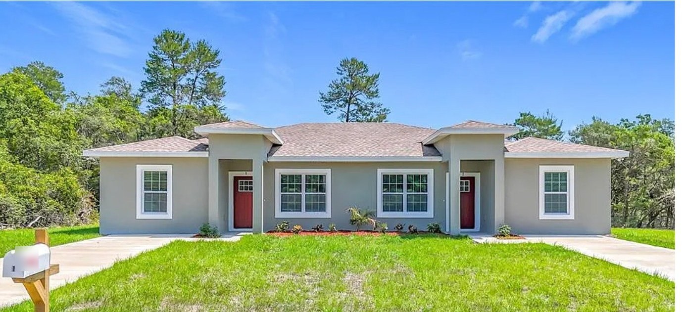 Completed MGM new-construction duplex in Central Florida